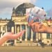 hand handing euro bills